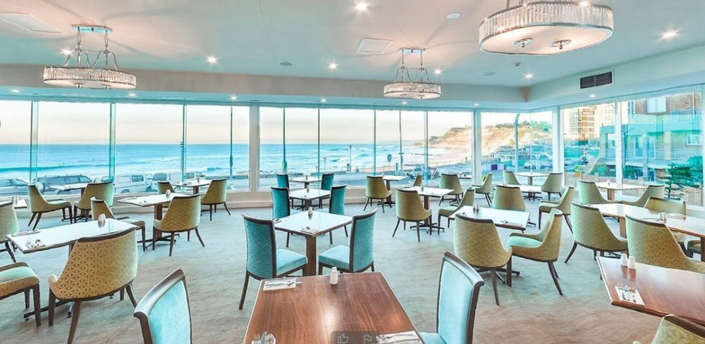 The dining room overlooking Newcastle Beach at NOAH'S Restaurant