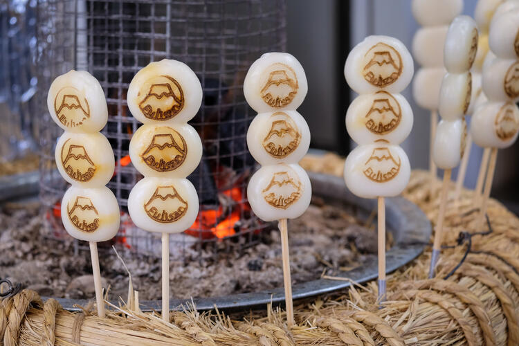  Two sets of sweet Dango dumplings on sticks: a popular Japanese street food