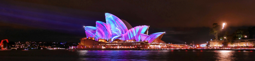 Opera House lit up at night during Vivid Sydney
